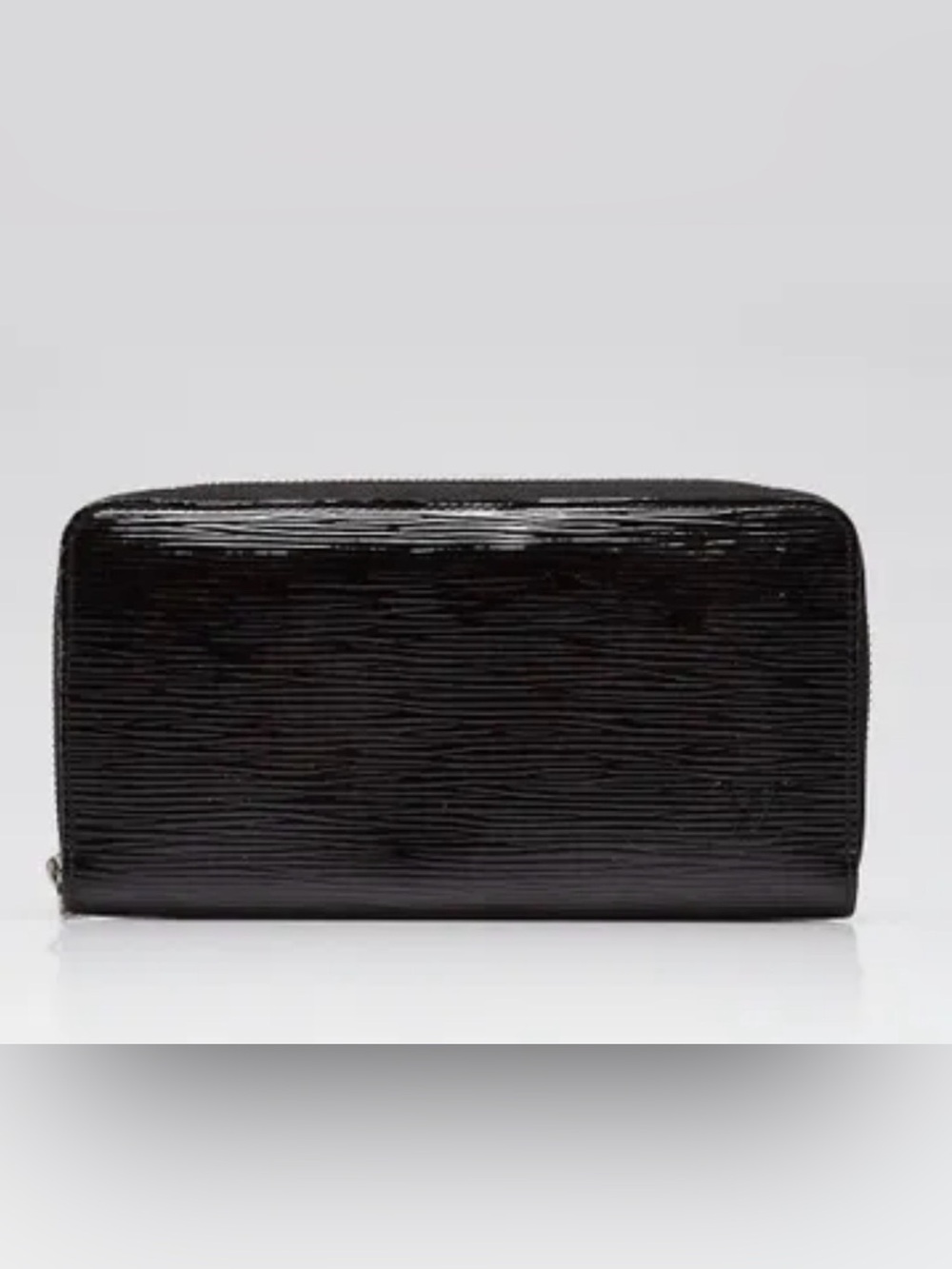 Louis  Vuitton glossy Epi Black wallet in excellent condition.